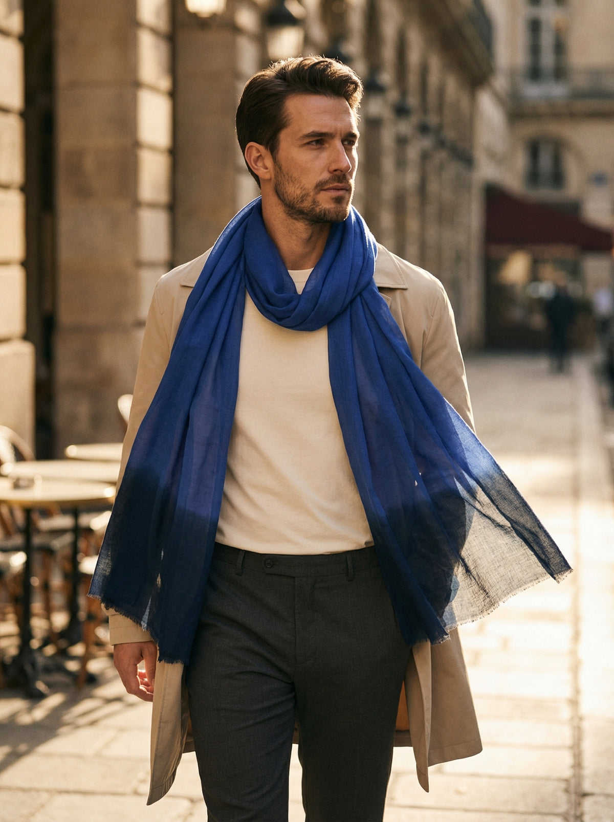Man wearing indigo Moroccan Tagelmust as a breathable desert headscarf, lightweight safari scarf built for Sahara trekking and dust protection.