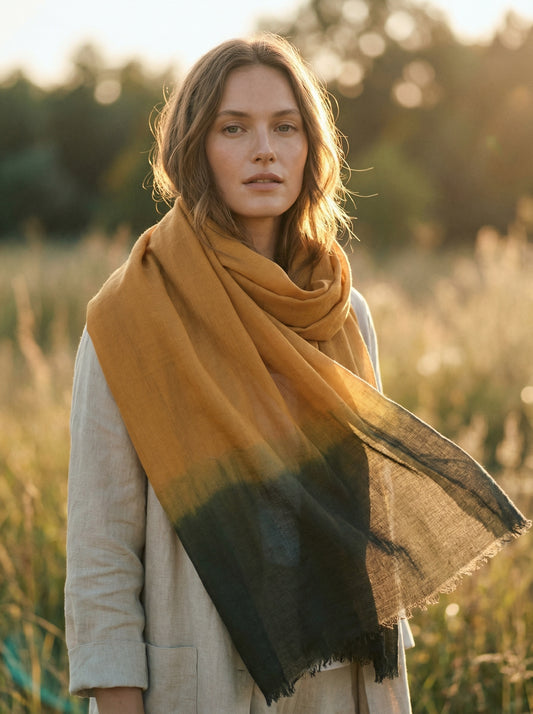Harvest gold Tagelmust styled as a lightweight travel scarf for women, Touareg inspired Moroccan headscarf ideal for safari adventures and warm desert climates.