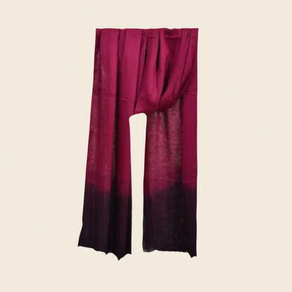 Amaranth Purple Soaked Tagelmust scarf – rich burgundy / wine red hanging wrap fading to deep plum gradient. Sustainably sourced lightweight Moroccan headscarf ideal for nomadic travelers searching for burgundy, wine, magenta, or dark‑purple scarves for hot‑weather, dry‑climate adventures.