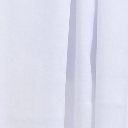 Close‑up of Ghost White Soaked Tagelmust scarf fabric – pure white Moroccan headscarf, sustainably sourced lightweight weave ideal for nomadic travelers searching for crisp white scarves for hot‑weather, dry‑climate adventures.