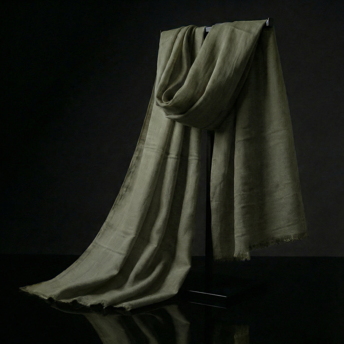 Lightweight Dark Moss Green Tagelmust in sustainably sourced rayon, designed as a breathable Moroccan desert headscarf for safari and hot climates.